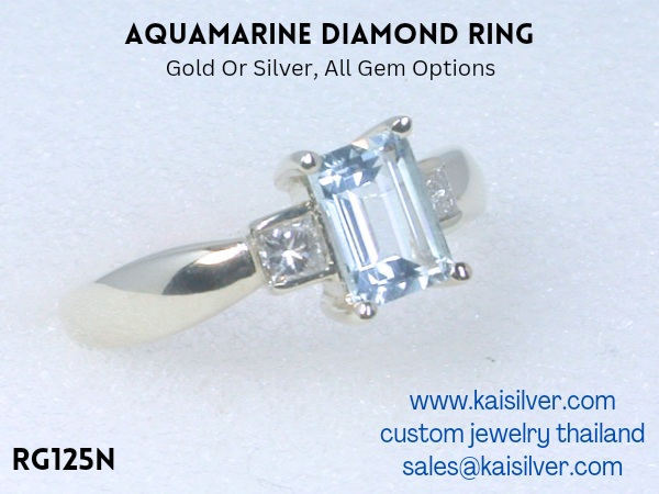 gemstone ring with aquamarine gold or silver